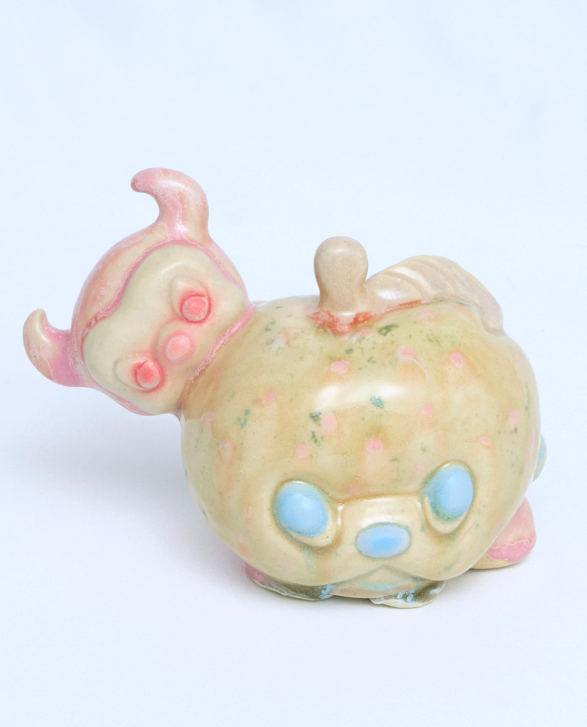 Caterpillar Devil Biting a Moldy Apple