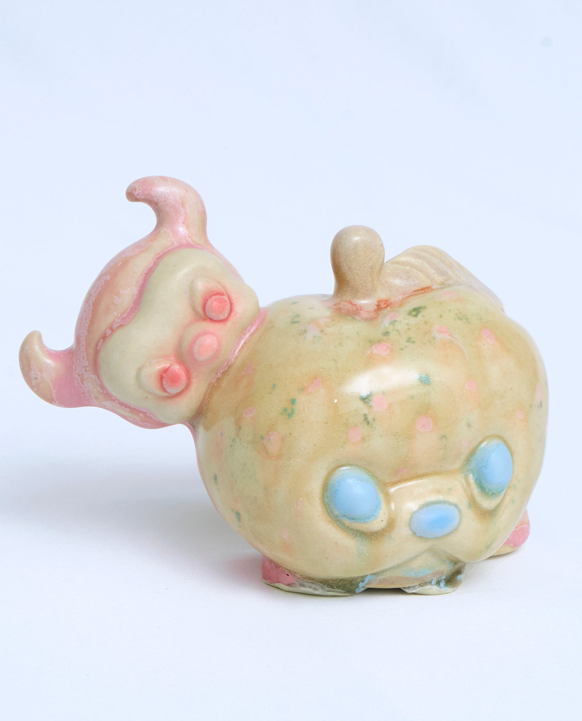 Caterpillar Devil Biting a Moldy Apple